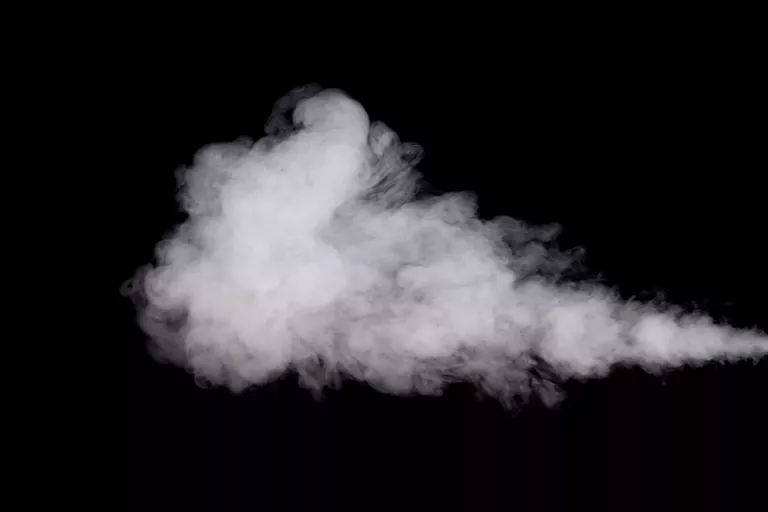 White smoke on black background